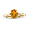 Thumbnail Image 0 of Oval Faceted Citrine and 0.05 CT. T.W. Diamond Side Accent Ring in 14K Gold