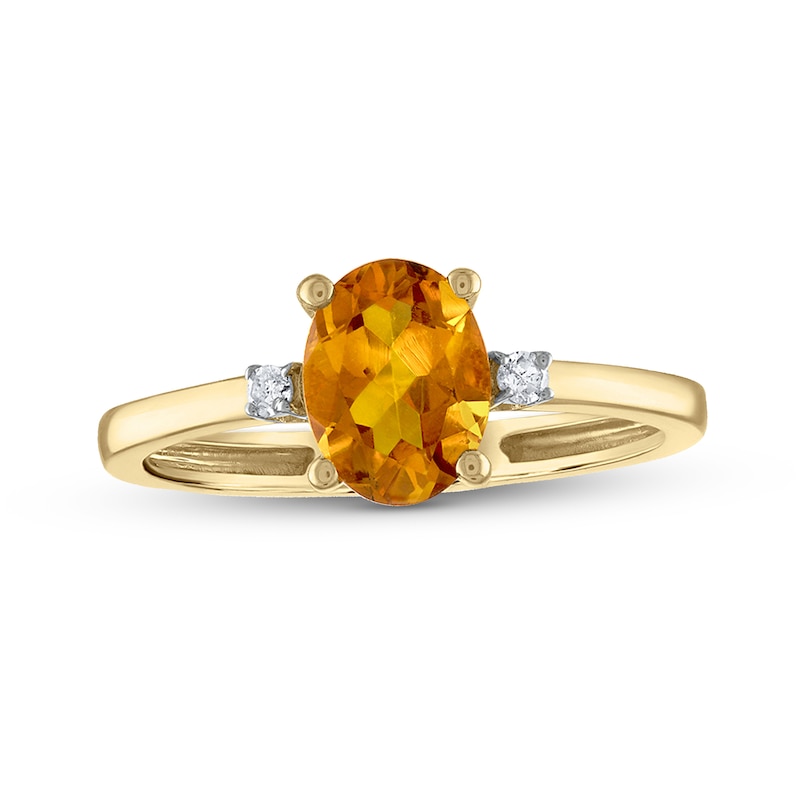 Oval Faceted Citrine and 0.05 CT. T.W. Diamond Side Accent Ring in 14K Gold