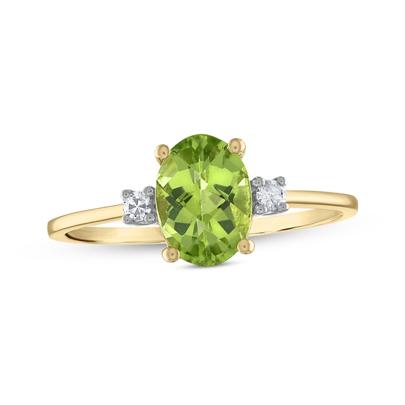 Oval Faceted Peridot and 0.05 CT. T.W. Diamond Side Accent Ring in 14K Gold