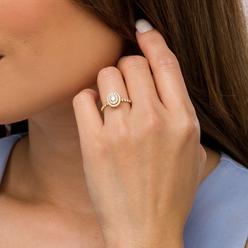 Main Image 2 of 0.45 CT. T.W. Oval Diamond Double Frame Vintage-Style Scallop Shank Engagement Ring in 14K Gold (I/SI2)