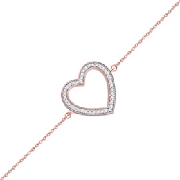 0.12 CT. T.W. Diamond Lined Heart Bracelet in 10K Rose Gold - 7.25&quot;