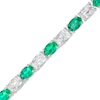 Thumbnail Image 1 of Oval Lab-Created Emerald and Cushion-Cut White Lab-Created Sapphire Alternating Line Bracelet in Sterling Silver – 7.25"