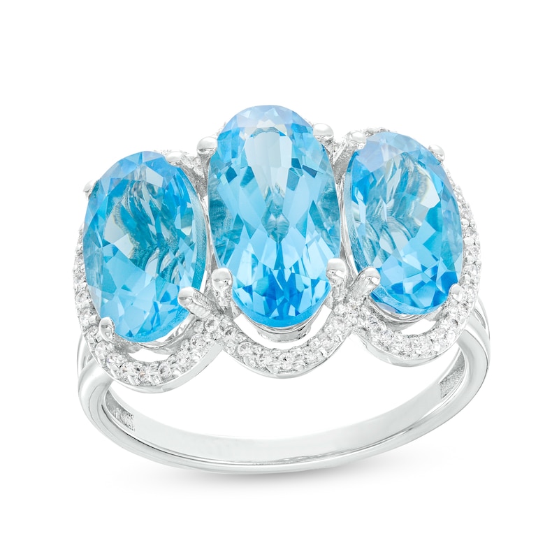 Oval Swiss Blue Topaz and 0.149 CT. T.W. Diamond Frame Trio Ring in 10K White Gold|Peoples Jewellers