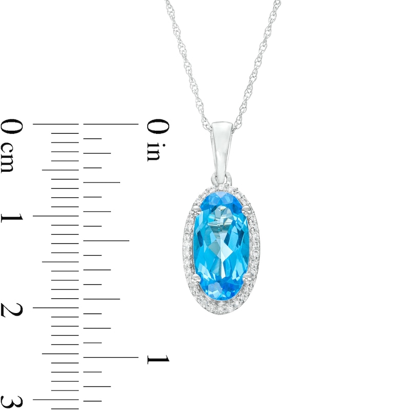 Oval Swiss Blue Topaz and 0.10 CT. T.W. Diamond Frame Pendant in 10K White Gold