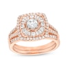 Thumbnail Image 0 of 0.95 CT. T.W. Diamond Baguette and Round Double Cushion Frame Split Shank Bridal Set in 10K Rose Gold