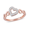 Thumbnail Image 0 of 0.05 CT. T.W. Diamond Five Tilted Open Heart Ring in Sterling Silver with 14K Rose Gold Plate