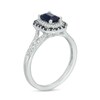 Emerald-Cut Blue Sapphire and 0.12 CT. T.W. Diamond Double Frame Split Shank Ring in 10K White Gold