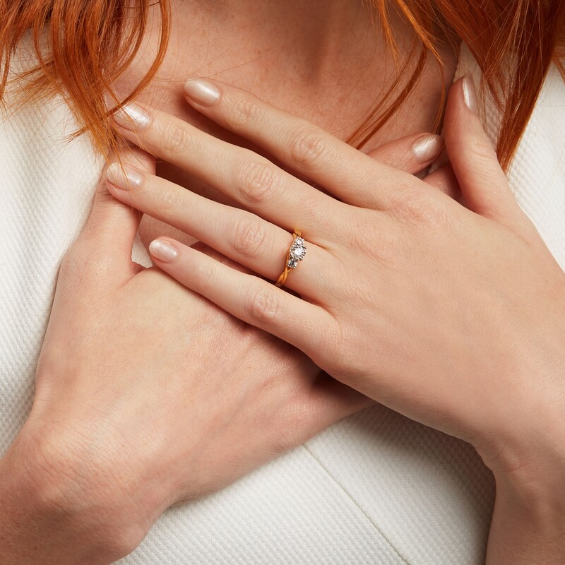 Main Image 2 of 0.50 CT. T.W. Diamond Past Present Future® Twist Shank Engagement Ring in 10K Gold