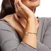 Thumbnail Image 2 of 0.25 CT. T.W. Baguette and Oval-Shaped Multi-Diamond Frame Overlapping Bangle in 10K White Gold