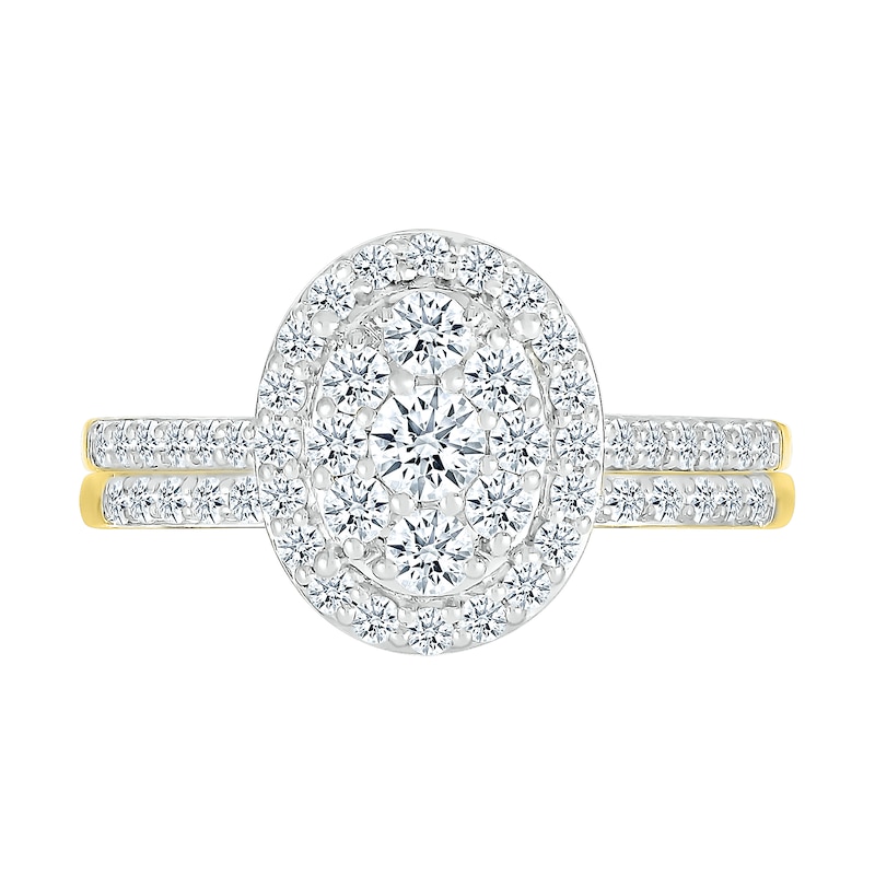 0.96 CT. T.W. Oval-Shaped Multi-Diamond Frame Bridal Set in 10K Gold