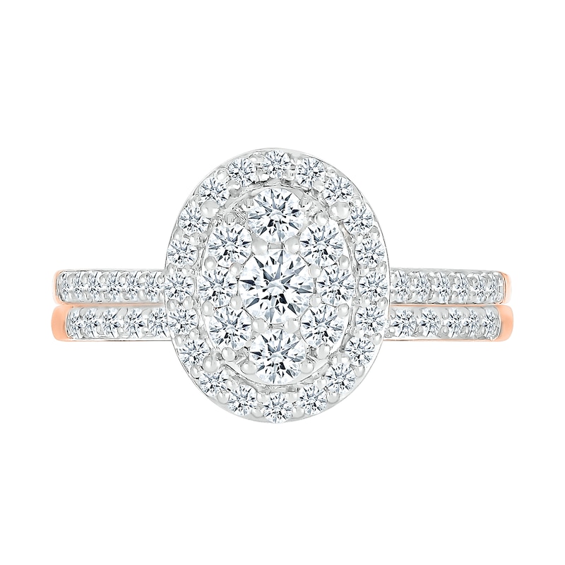 0.96 CT. T.W. Oval-Shaped Multi-Diamond Frame Bridal Set in 10K Rose Gold