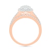 0.96 CT. T.W. Oval-Shaped Multi-Diamond Frame Bridal Set in 10K Rose Gold