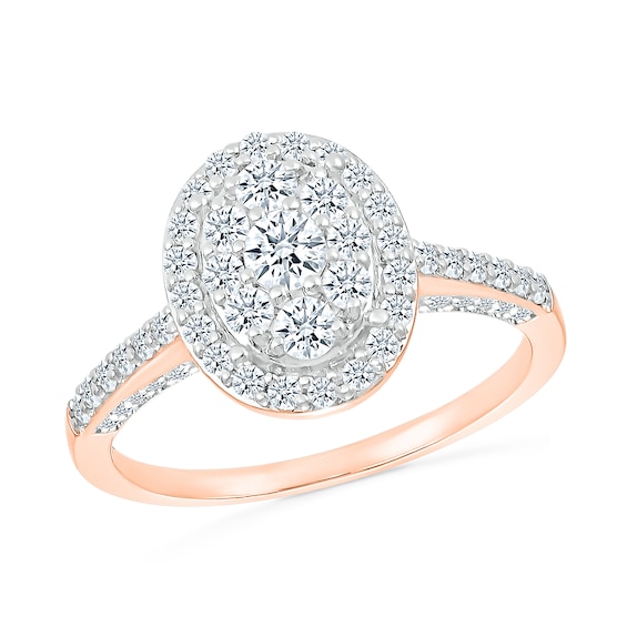 0.96 CT. T.W. Oval-Shaped Multi-Diamond Frame Bridal Set in 10K Rose Gold