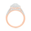 0.95 CT. T.W. Oval-Shaped Multi-Diamond Double Frame Bridal Set in 10K Rose Gold