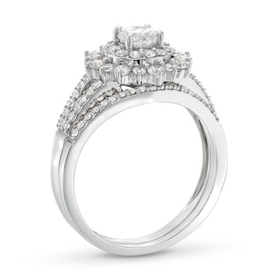0.95 CT. T.W. Diamond Double Flower Frame Split Shank Bridal Set in 10K White Gold (J/I3)