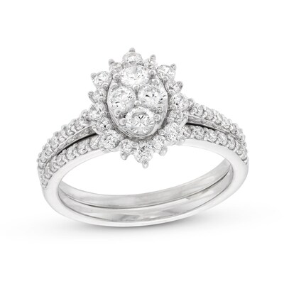 0.95 CT. T.W. Oval-Shaped Multi-Diamond Flower Frame Bridal Set in 10K Gold (J/I3