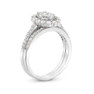 0.95 CT. T.W. Oval-Shaped Multi-Diamond Frame Bridal Set in 10K White Gold (J/I3)