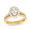Thumbnail Image 1 of 0.95 CT. T.W. Oval-Shaped Multi-Diamond Frame Bridal Set in 10K Gold (J/I3)