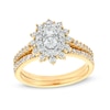 Thumbnail Image 0 of 0.95 CT. T.W. Oval-Shaped Multi-Diamond Double Flower Frame Bridal Set in 10K Gold (J/I3)