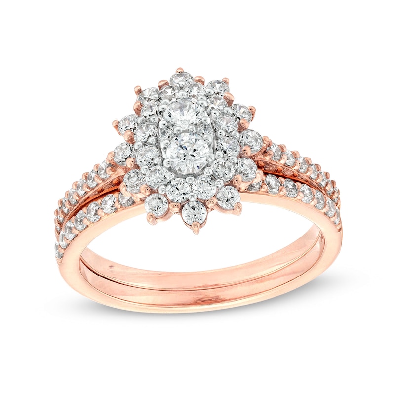 Main Image 1 of 0.95 CT. T.W. Oval-Shaped Multi-Diamond Double Flower Frame Bridal Set in 10K Rose Gold (J/I3)