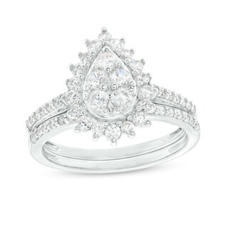 0.95 CT. T.W. Pear-Shaped Multi-Diamond Flower Frame Bridal Set in 10K Gold (J/I3