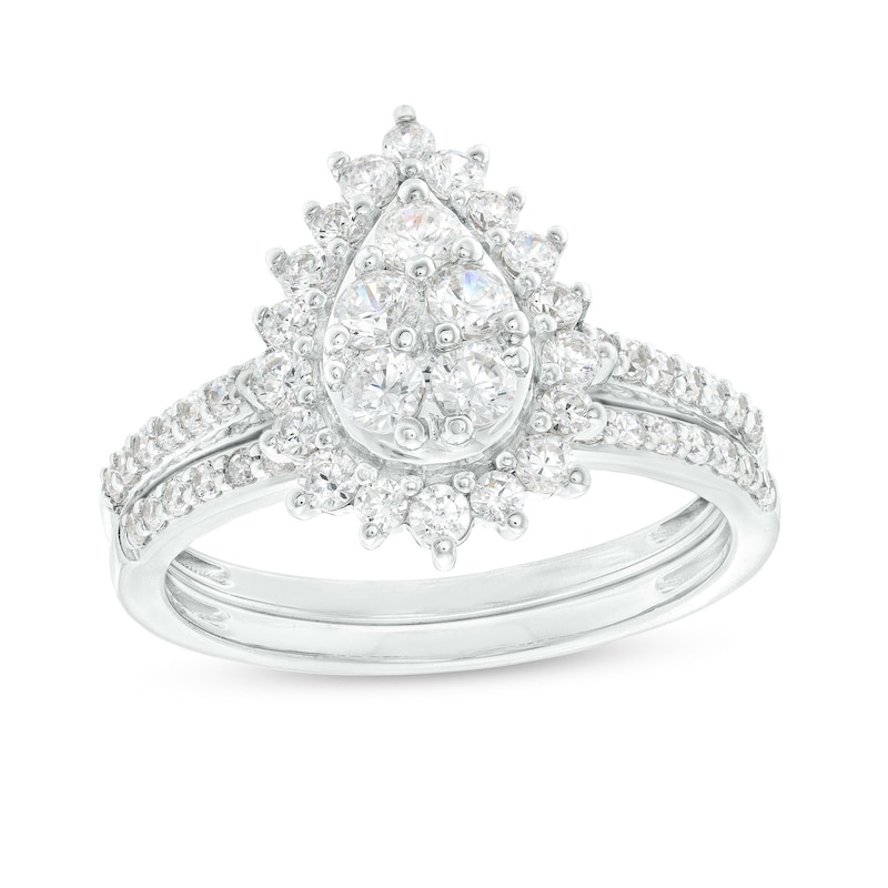 0.95 CT. T.W. Pear-Shaped Multi-Diamond Flower Frame Bridal Set in 10K Gold (J/I3