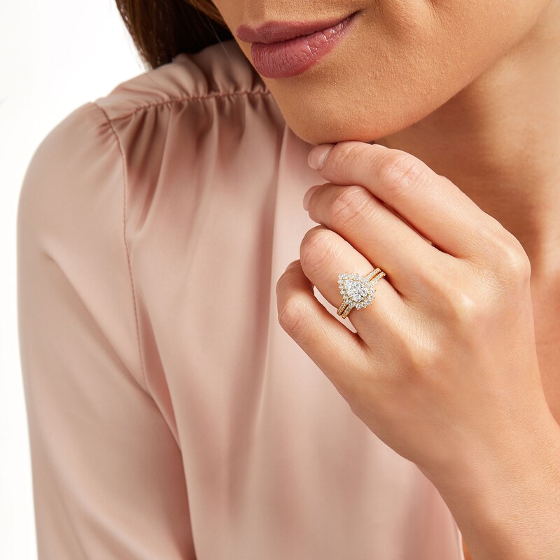Main Image 2 of 0.95 CT. T.W. Pear-Shaped Multi-Diamond Flower Frame Bridal Set in 10K Gold (J/I3)