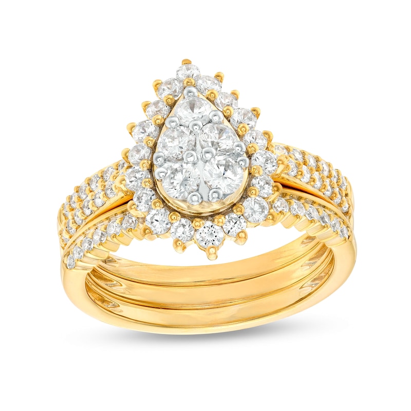 1.115 CT. T.W. Pear-Shaped Multi-Diamond Flower Frame Three Piece Bridal Set in 10K Gold (J/I3)