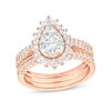 1.115 CT. T.W. Pear-Shaped Multi-Diamond Flower Frame Three Piece Bridal Set in 10K Rose Gold (J/I3)