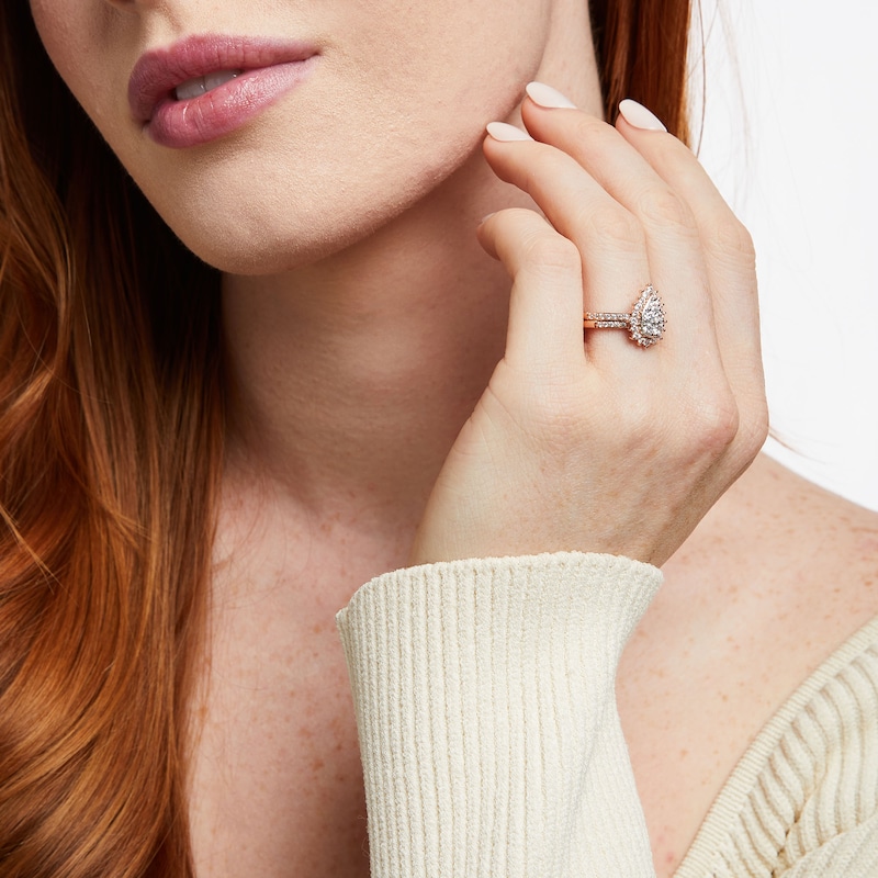 Main Image 2 of 0.95 CT. T.W. Pear-Shaped Multi-Diamond Flower Frame Bridal Set in 10K Rose Gold (J/I3)
