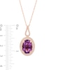 Oval Amethyst and 0.32 CT. T.W. Diamond Double Frame Curved Bail Pendant in 10K Rose Gold
