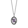 Enchanted Disney Villains Ursula Oval Amethyst and 0.115 CT. T.W. Black Diamond Open Pendant in Sterling Silver - 19"