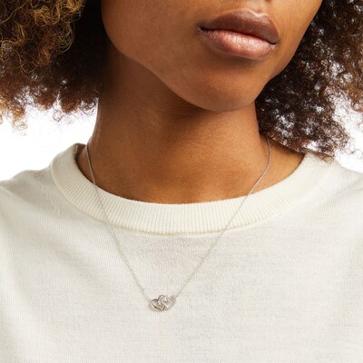 0.065 CT. T.W. Diamond Interlocking Hearts Necklace in Sterling Silver