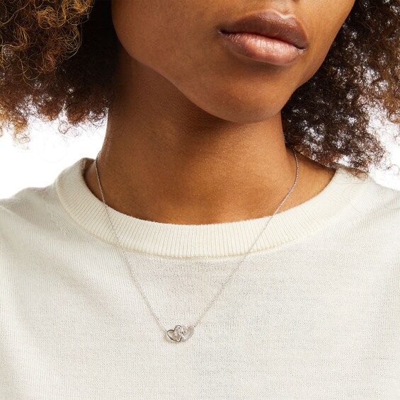 0.065 CT. T.W. Diamond Interlocking Hearts Necklace in Sterling Silver