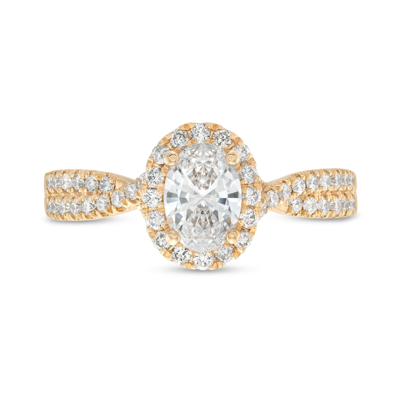 1.00 CT. T.W. Oval Diamond Frame Twist Shank Engagement Ring in 14K Gold (F/SI2)