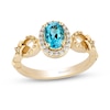 Thumbnail Image 1 of Enchanted Disney Jasmine Oval Swiss Blue Topaz and 0.145 CT. T.W. Diamond Frame Star Sides Ring in 10K Gold