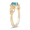 Thumbnail Image 2 of Enchanted Disney Jasmine Oval Swiss Blue Topaz and 0.145 CT. T.W. Diamond Frame Star Sides Ring in 10K Gold