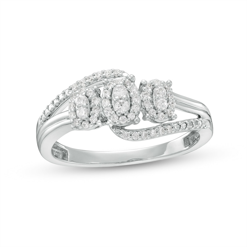 0.25 CT. T.W. Oval-Shaped Multi-Diamond Frame Bypass Three Stone Ring in 10K White Gold