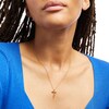 Thumbnail Image 2 of 0.04 CT. Diamond Solitaire Cross Pendant in 10K Gold
