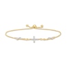 0.23 CT. T.W. Diamond Alternating Infinity Loop Cross Bolo Bracelet in 10K Gold – 10"
