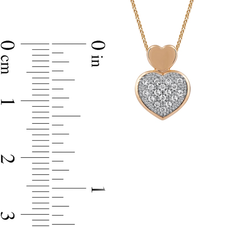 0.05 CT. T.W. Diamond Big and Little Heart Stacked Pendant in 10K Gold