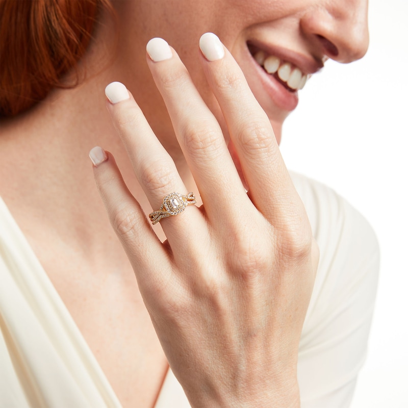 Main Image 2 of 0.58 CT. T.W. Emerald-Cut Diamond Double Frame Twist Shank Bridal Set in 10K Gold