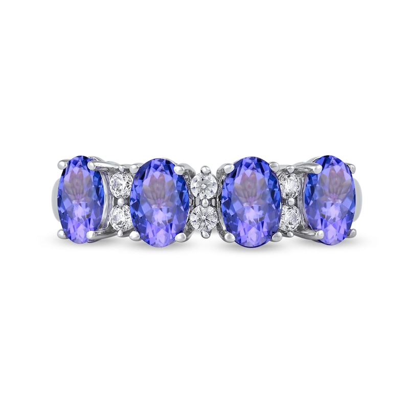 Oval Tanzanite and 0.15 CT. T.W. Diamond Alternating Anniversary Band in 10K White Gold