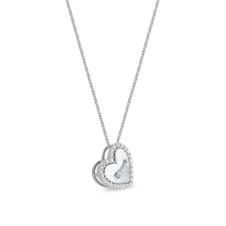 0.10 CT. T.W. Diamond Tilted Heart Button Pendant in 10K White Gold