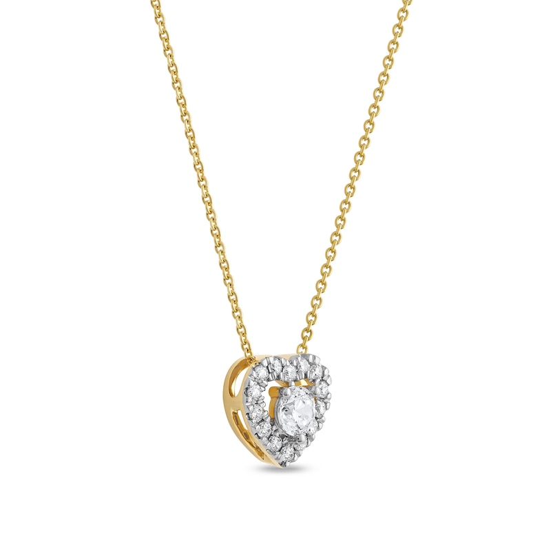 0.40 CT. T.W. Diamond Interior Stone Heart Frame Necklace in 10K Gold