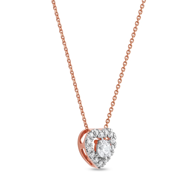 0.40 CT. T.W. Diamond Interior Stone Heart Frame Necklace in 10K Rose Gold