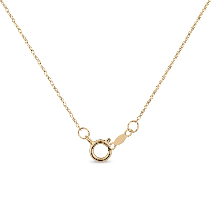 Oval Opal and 0.115 CT. T.W. Baguette and Round Diamond Starburst Frame Pendant in 10K Gold
