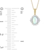 Oval Opal and 0.115 CT. T.W. Baguette and Round Diamond Starburst Frame Pendant in 10K Gold