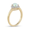 Thumbnail Image 1 of Oval Opal and 0.115 CT. T.W. Baguette and Round Diamond Starburst Frame Ring in 10K Gold