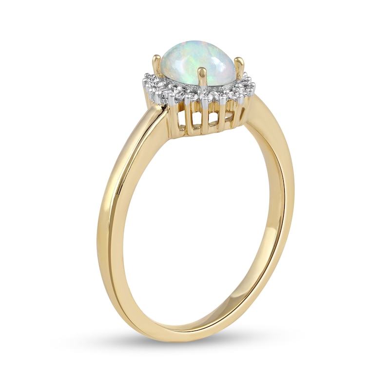 Oval Opal and 0.115 CT. T.W. Baguette and Round Diamond Starburst Frame Ring in 10K Gold|Peoples Jewellers